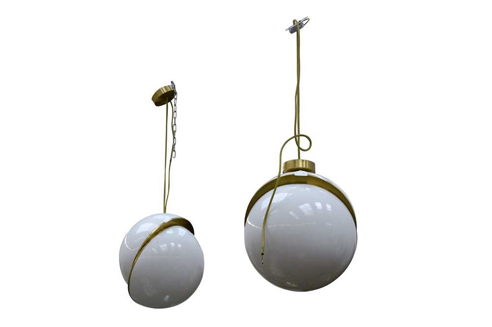 Lot 524 - A pair of Crescent Pendant lights, 21st century, designed by Lee Broom