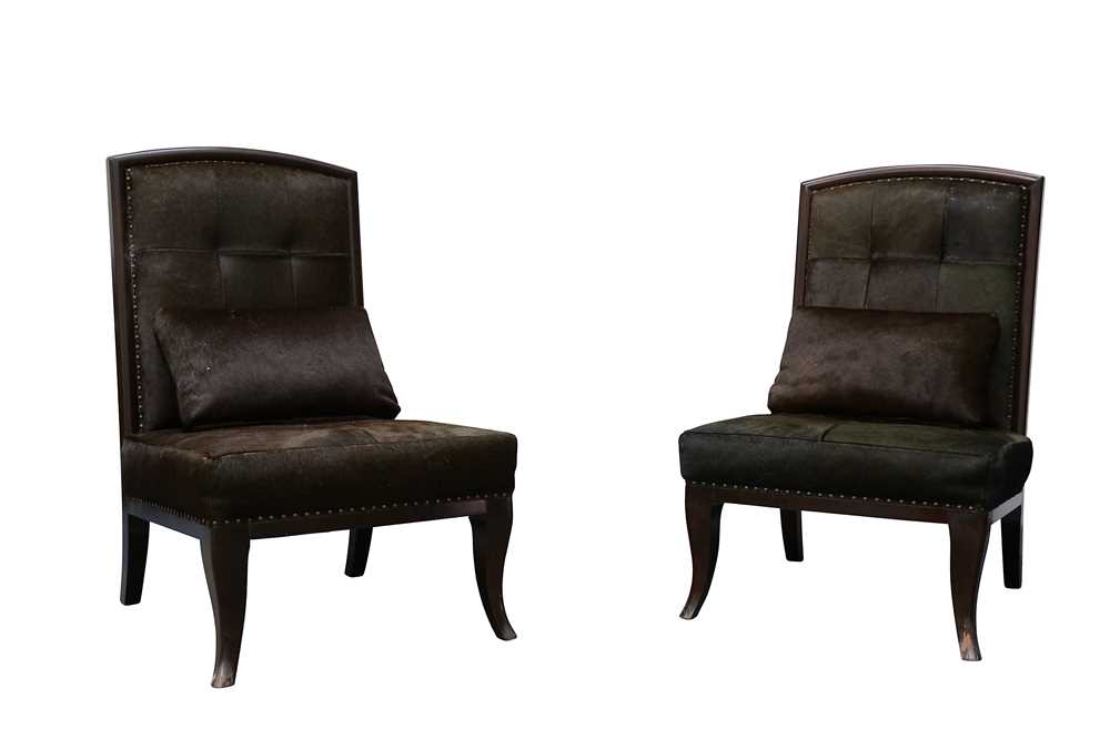 Lot 738 - A pair of contemporary cow hide upholstered chairs