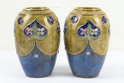 Lot 375 - A pair of Victorian Doulton stoneware vases, by M Welsby