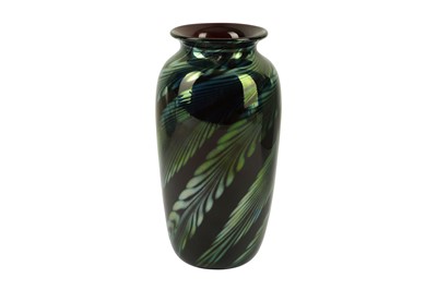 Lot 283 - A 20th century purple glass green lustre vase,...