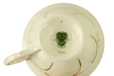 Lot 378 - A collection of twelve trios of cups, saucers and side plates, 19th century and later