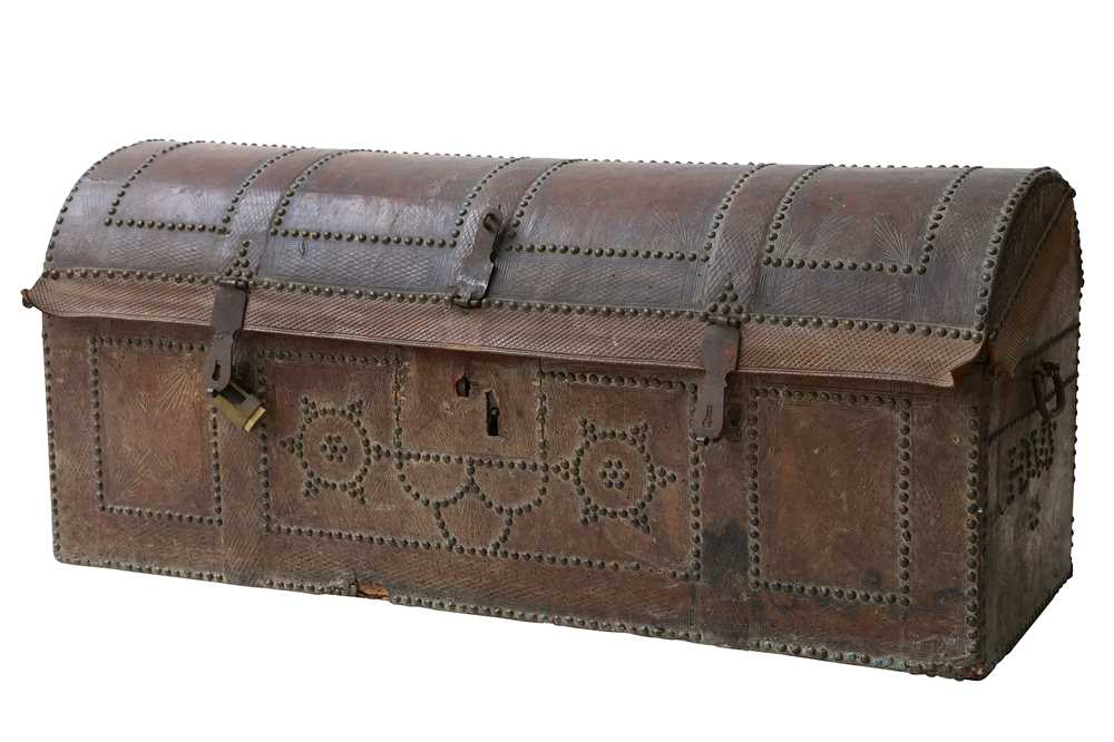 Lot 495 - An 18th Century central European leather dome top chest