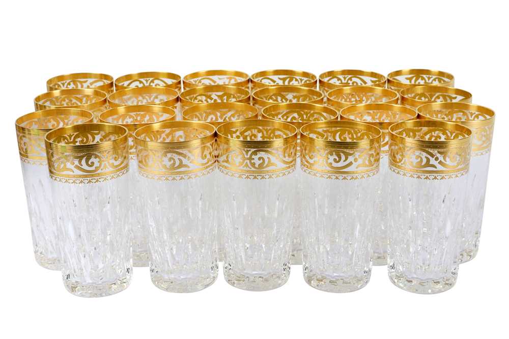 Lot 301 - A quantity of St Louis crystal highball drinking glasses with gilt rims