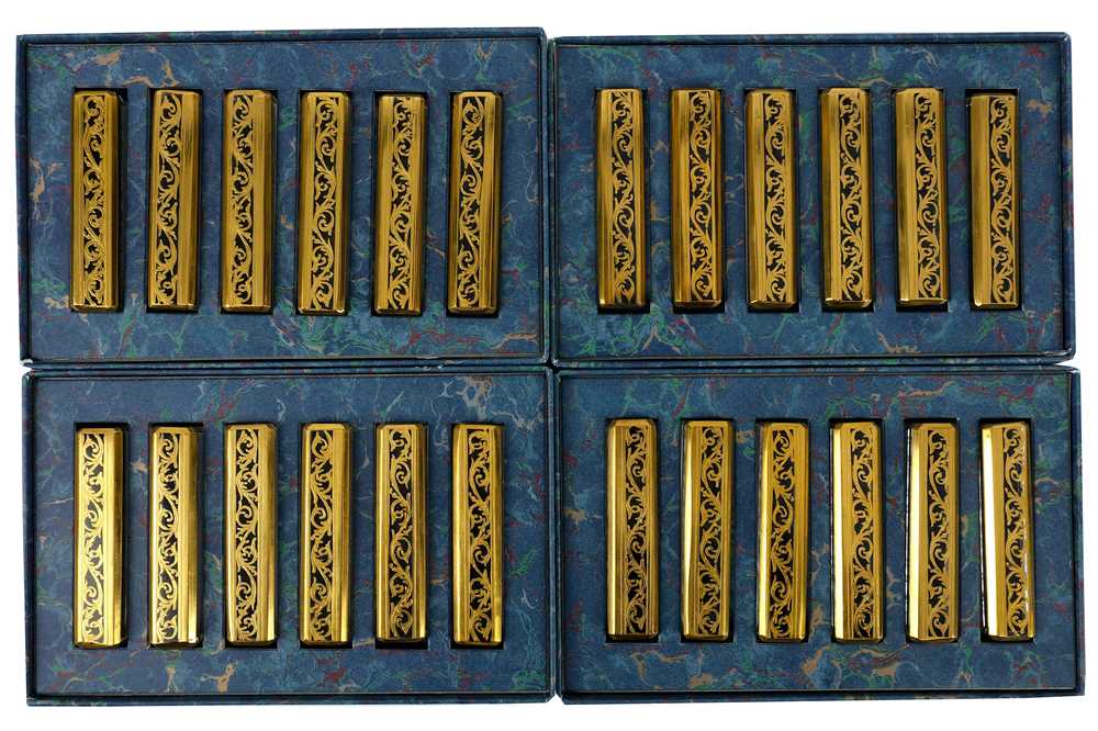 Lot 309 - A set of 24 St Louis glass knife rests in presentation boxes.