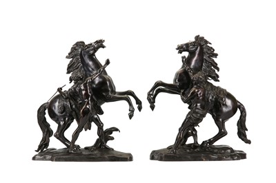 Lot 58 - A LARGE PAIR OF MID 19TH CENTURY FRENCH BRONZE MODELS OF THE MARLY HORSES AFTER THE MODELS BY GUILLAUME COUSTOU (FRENCH, 1677-1746)