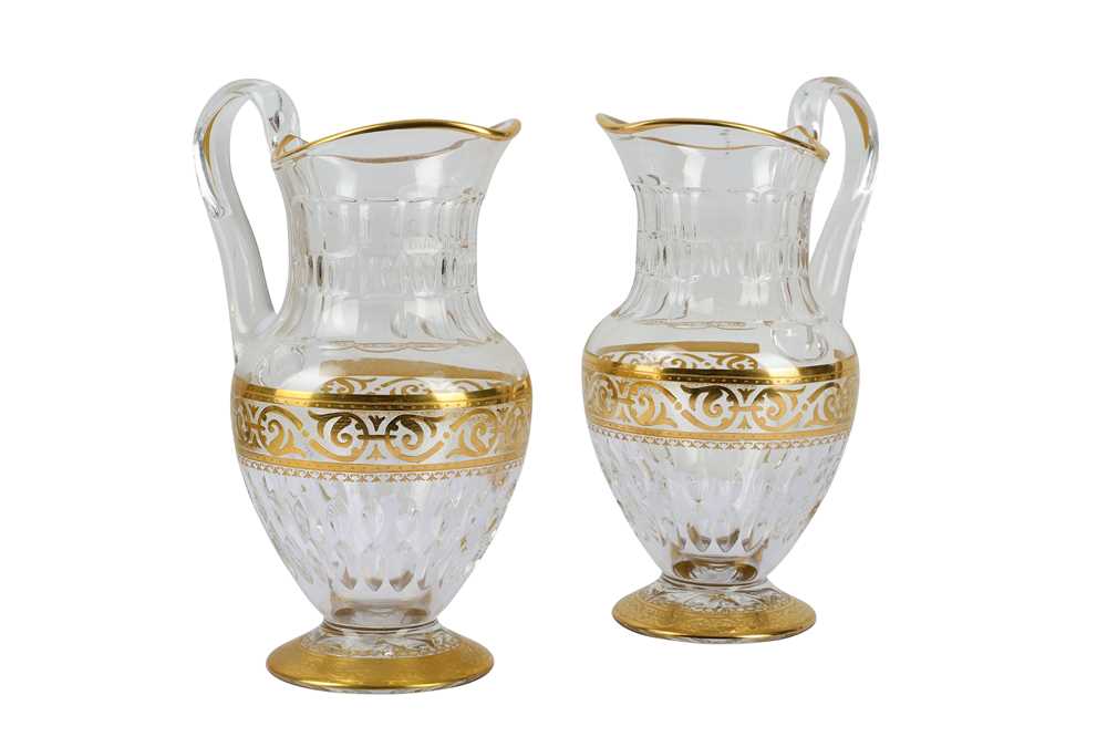 Lot 304 - Two St Louis crystal pitchers with gilt borders
