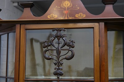 Lot 152 - Manner of Shapland & Petter, an Art Nouveau display cabinet