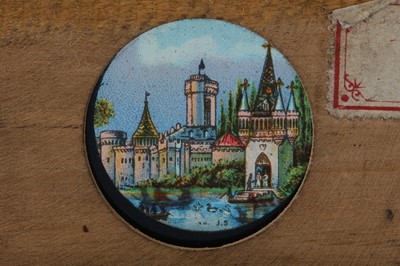 Lot 165 - Three late 19th / early 20th century wooden mounted painted glass magic lantern slides