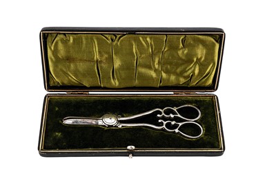 Lot 204 - A cased pair of Victorian sterling silver grape scissors, Sheffield 1899 by James Deakin & Sons