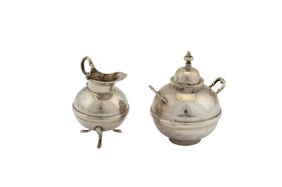 Lot 39 - A late 19th century Dutch silver miniature or ‘toy’ four-piece tea service, Groningen circa 1880