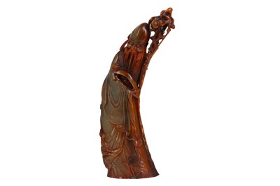 Lot 235 - A CHINESE HORN CARVING OF SHOULAO.