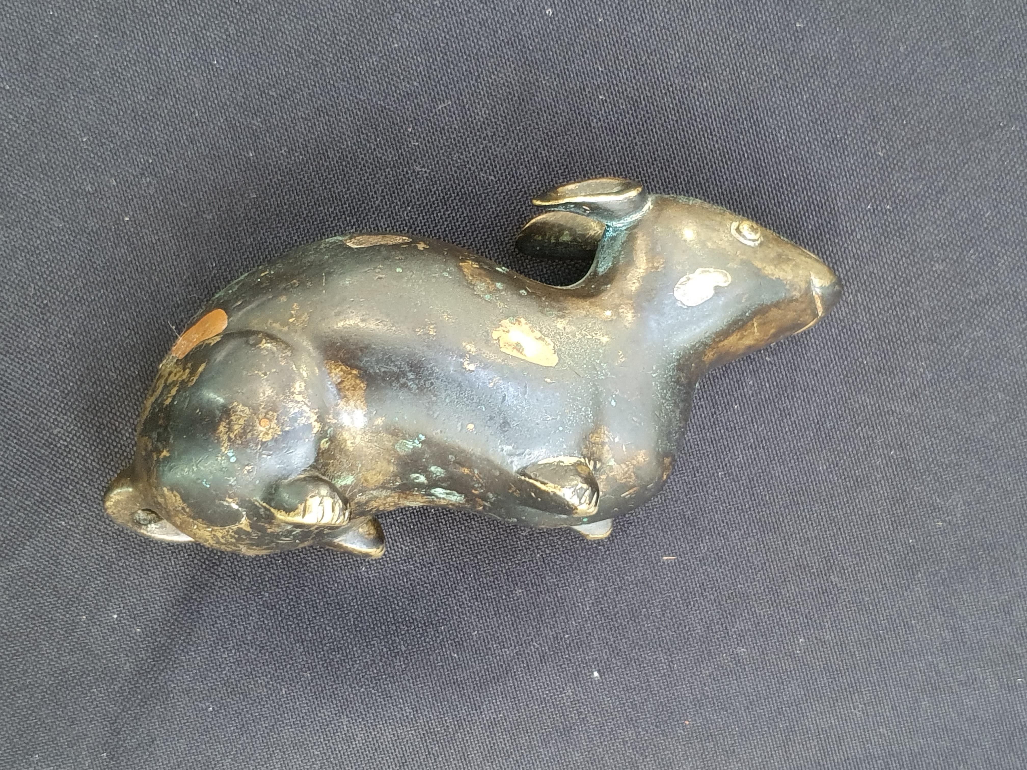 Lot 17 - A CHINESE COPPER AND SILVER-SPLASHED BRONZE