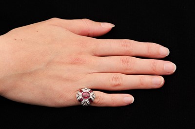 Lot 1 - A ruby and diamond bombé ring, circa 1950