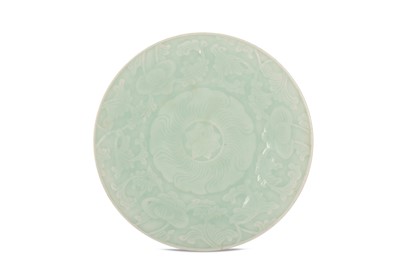 Lot 522 - A CHINESE CELADON-GLAZED FLORAL DISH.