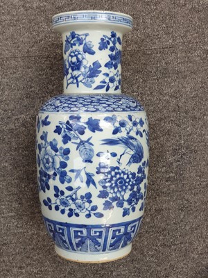 Lot 346 - A CHINESE BLUE AND WHITE 'BIRDS AND FLOWER' VASE.
