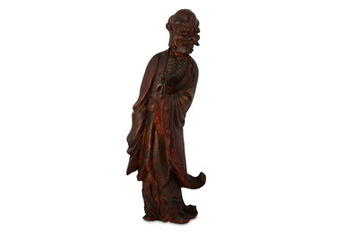 Lot 674 - A CHINESE LACQUERED WOOD FIGURE OF A LUOHAN.