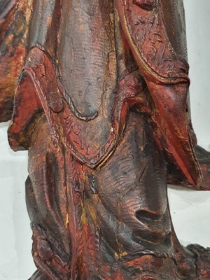 Lot 59 - A CHINESE LACQUERED WOOD FIGURE OF A LUOHAN.