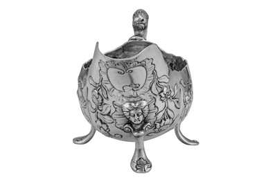 Lot 285 - A George II Irish sterling silver sauce boat, Dublin circa 1750 by Andrew Goodwin (free 1730, died 1787)