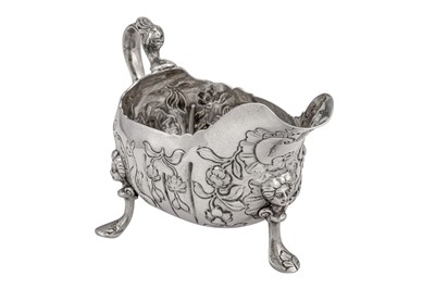 Lot 285 - A George II Irish sterling silver sauce boat, Dublin circa 1750 by Andrew Goodwin (free 1730, died 1787)