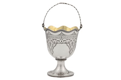 Lot 298 - A Victorian sterling silver sugar basket, London 1867 by Henry Holland