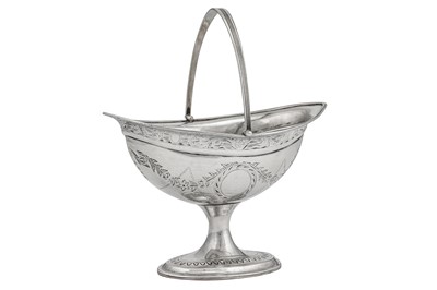 Lot 284 - A George III Irish sterling silver sugar basket, Dublin 1796 by George West
