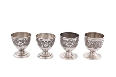 Lot 88 - Two pairs of mid-20th century Iranian (Persian) unmarked silver egg cups, Isfahan circa 1960