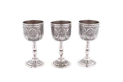 Lot 96 - A set of six mid-20th century Iranian (Persian) unmarked silver spirit cups, Isfahan circa 1960