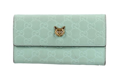 Lot 139 - Gucci Pastel Green Cat Head Continental Wallet
