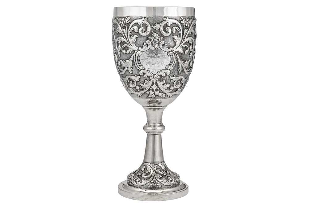 A late 19th century Indian colonial unmarked silver trophy standing cup...
