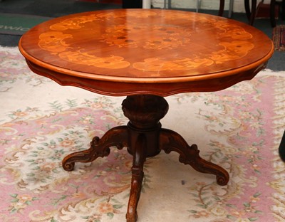 Lot 529 - A reproduction marquetry inlaid circular top...