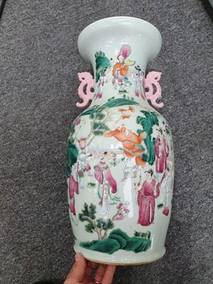 Lot 20 - A PAIR OF CHINESE FAMILLE ROSE FIGURATIVE VASES.