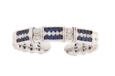 Lot 150 - A sapphire and diamond bangle and ring