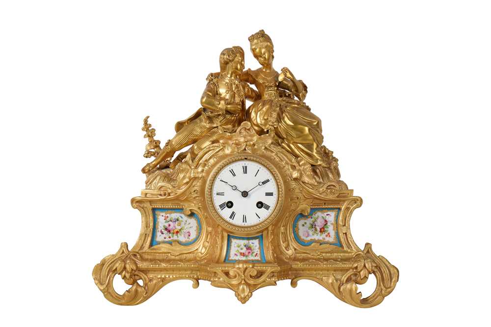Lot 193 - A MID 19TH CENTURY FRENCH GILT BRONZE AND BLUE PORCELAIN FIGURAL MANTEL CLOCK