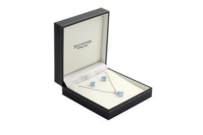 Lot 25 - A blue topaz pendant necklace and earstuds