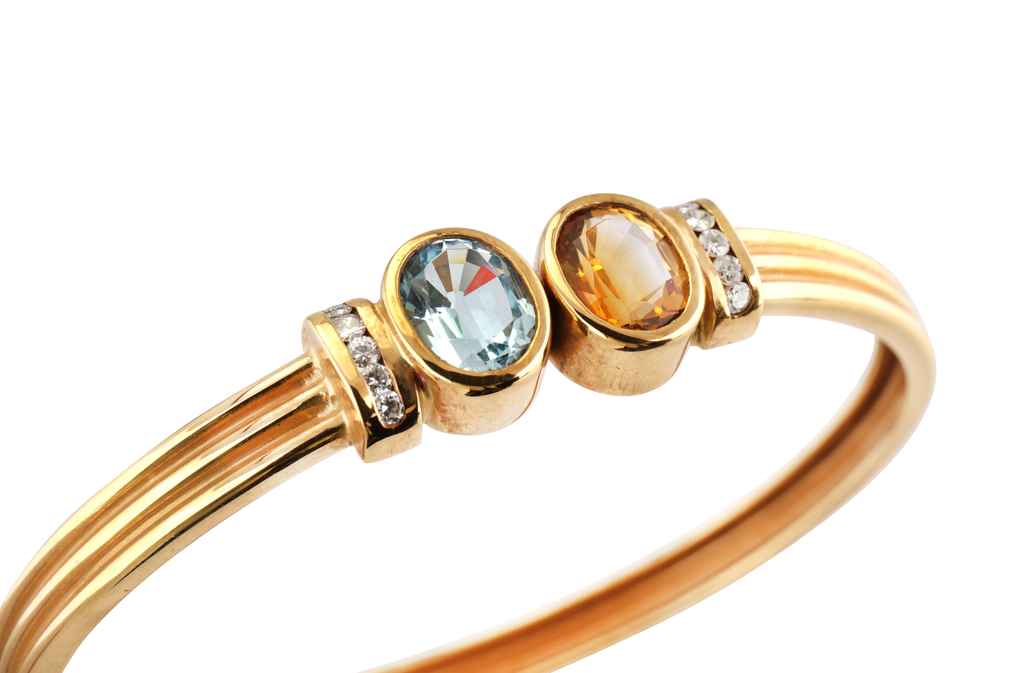 Lot 52 - A Citrine, Blue Topaz And Diamond Bangle