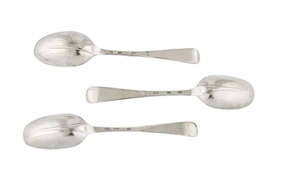 Lot 252 - A set of three George I Britannia standard silver dessert spoons, London 1717 makers mark heavily obscured, possibly George Lambe (reg. 10th June 1713)