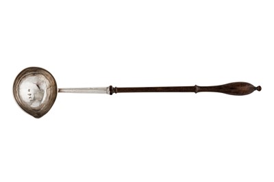 Lot 211 - A George II sterling silver punch ladle, London 1741 by William Justis (reg. 28th June 1739)
