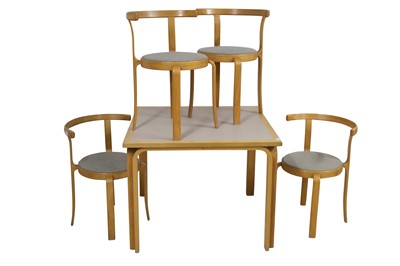 Lot 165 - Magnus Olesen, a set of four circa 1980's Danish beech Series 8000 stacking chairs