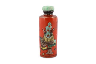 Lot 515 - A CHINESE FAMILLE VERTE RED-GROUND SNUFF BOTTLE.