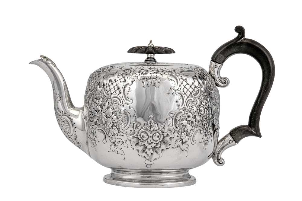 Lot 309 - A Victorian sterling silver teapot, London 1897 by Goldsmiths & Silversmiths Co