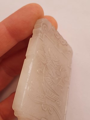 Lot 429 - A CHINESE WHITE JADE 'LOTUS' PLAQUE.