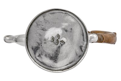 Lot 294 - A George II ‘duty dodger’ silver bachelor coffee pot, London circa 1740 by Edward Feline (reg. 25th Aug 1720)