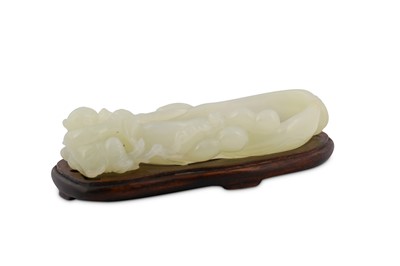 Lot 730 - A CHINESE WHITE JADE 'BOY AND GOURDS' BRUSH WASHER.