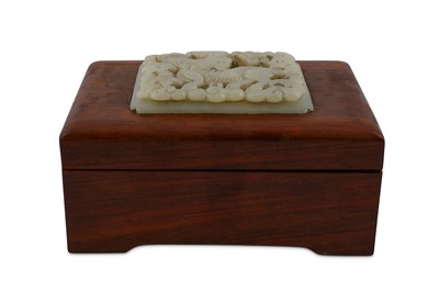 Lot 728 - A CHINESE WOOD BOX SET WITH A 'QILIN' JADE PLAQUE.