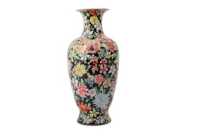 Lot 21 - A CHINESE FAMILLE ROSE BLACK-GROUND 'MILLEFLEUR' VASE.