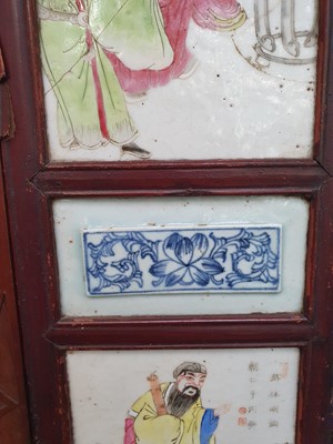 Lot 102 - A CHINESE FAMILLE ROSE TWO-FOLD SCREEN.