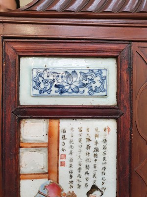 Lot 132 - A CHINESE FAMILLE ROSE TWO-FOLD SCREEN.