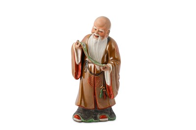 Lot 903 - A CHINESE FAMILLE ROSE FIGURE OF A SAGE.