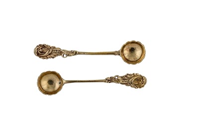 Lot 219 - A pair of George II / George III unmarked silver gilt salt spoons, probably London circa 1760