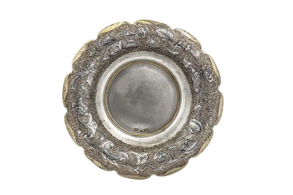 Lot 48 - An Alexander II Russian provincial parcel gilt and niello 84 zolotnik (875 standard) silver saucer, circa 1860, makers mark obscured possibly MK